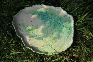 Hand made ceramic plate with pressed fern